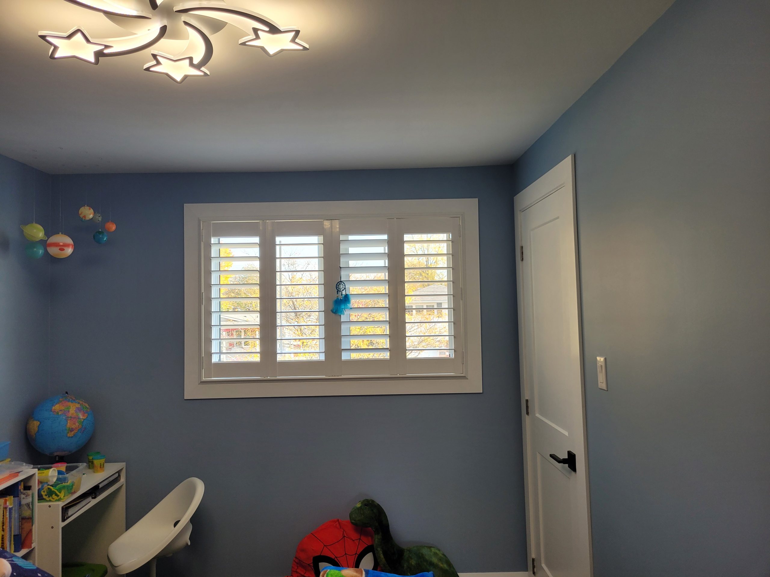 PLANTATION SHUTTERS AND CURTAINS FOR WINDOW TREATMENTS